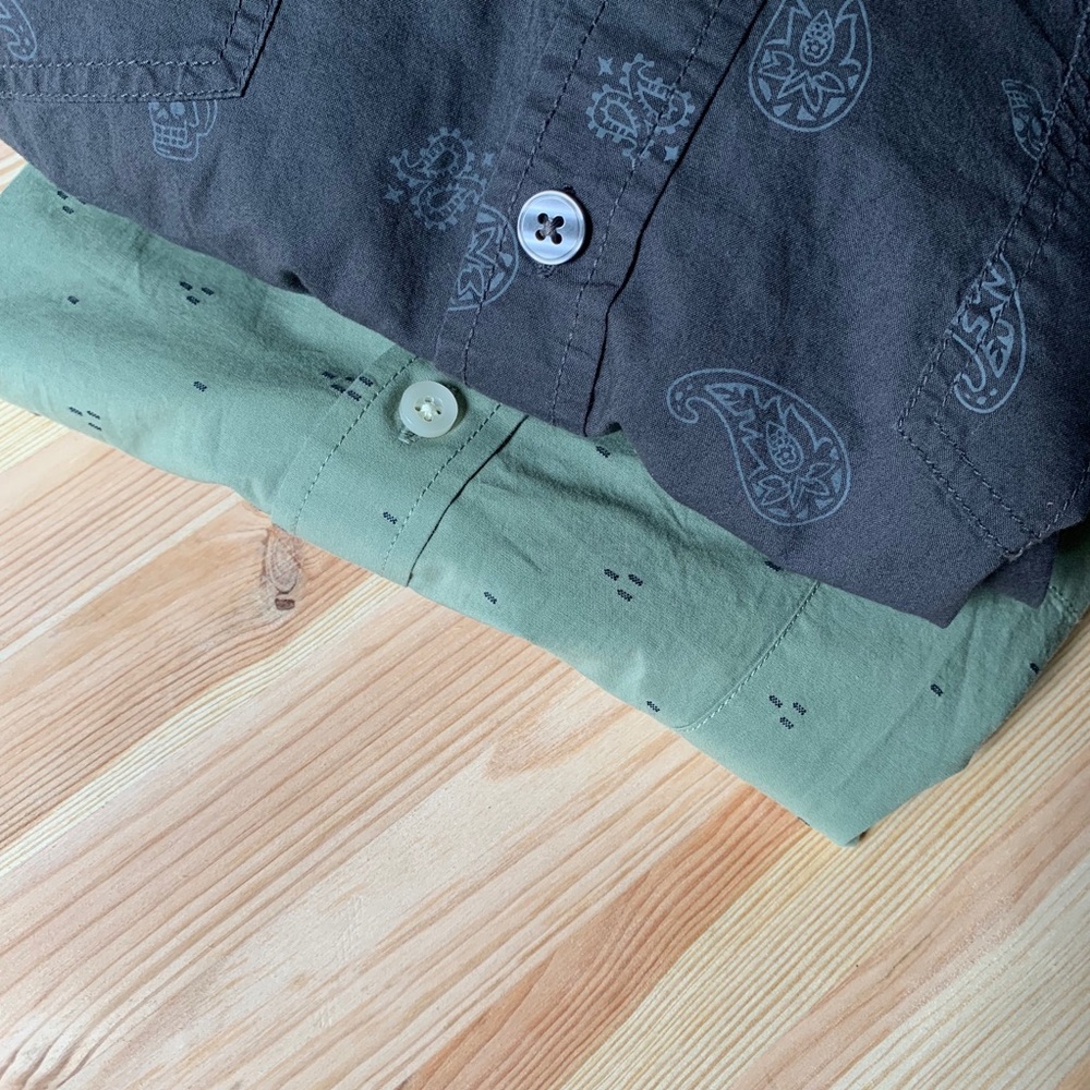 Two casual dress shirts.